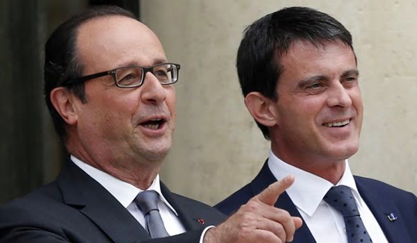 Hollande y el renunciante primer ministro, Manuel Valls. 