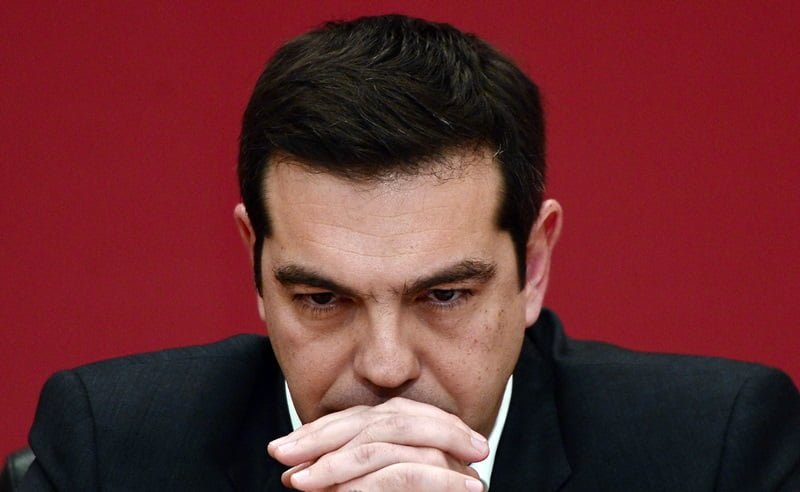 TOPSHOTS The leader of the leftist Syriza party, Alexis Tsipras, listens to a question during a televised press conference on January 23, 2015 at the Zappion Hall in Athens. Greeks vote on January 25 in a general election for the second time in three years, with radical leftists Syriza leading the polls with a promise to renegotiate the international bailout that has imposed five years of austerity on the country.   AFP PHOTO/LOUISA GOULIAMAKI
