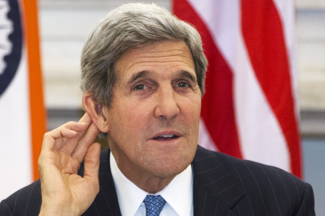 U.S. Secretary of State John Kerry gestures as he asks a reporter to repeat a question during a news conference with Indian Foreign Minister Salman Khurshid (not pictured) at Hyderabad House in New Delhi, India June 24, 2013. REUTERS/Jacquelyn Martin/Pool (INDIA - Tags: POLITICS)